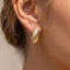 Gold Dipped Croissant Twist Huggie Hoop Earrings: G