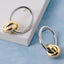 Polished Knot Charm Oval Hoop Earrings: TT