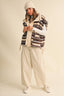 A STRIPED PLUSH FLEECE OVERSIZED VEST: MULTI
