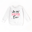 In my XOXO Era Sweater