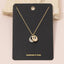 Gold Interlocking Ring Charm Pendant Necklace: TT