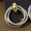 Two Tone Twisted Double Hoop Drop Earrings: TT