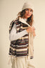 A STRIPED PLUSH FLEECE OVERSIZED VEST: MULTI