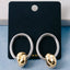 Polished Knot Charm Oval Hoop Earrings: TT