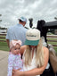 He's Golfing - Green Vintage Trucker Hat