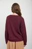 TEXTURED RAW EDGE LONG SLEEVE KNIT SWEATER: OXBLOOD